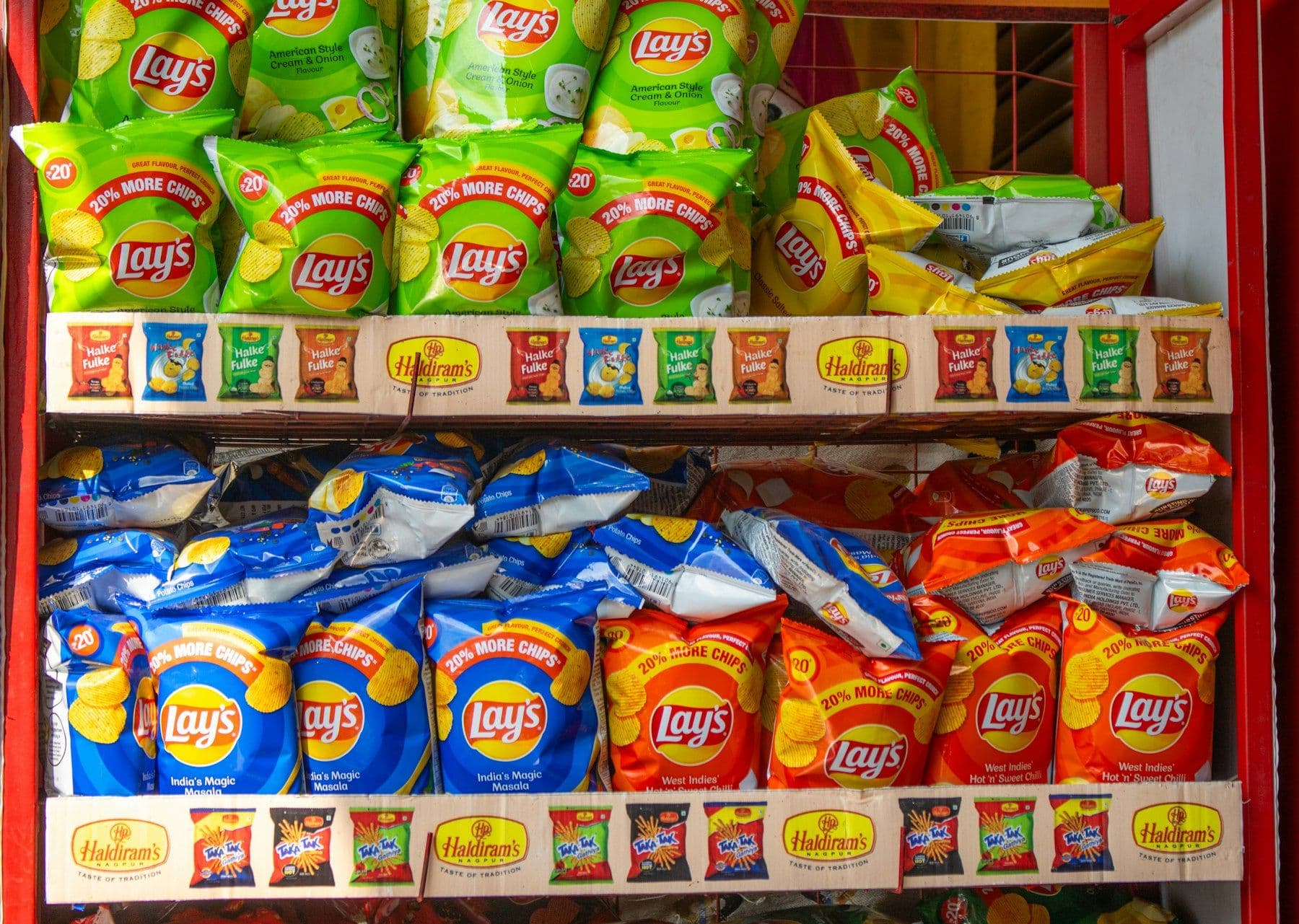 A store display packed with bags of crisps